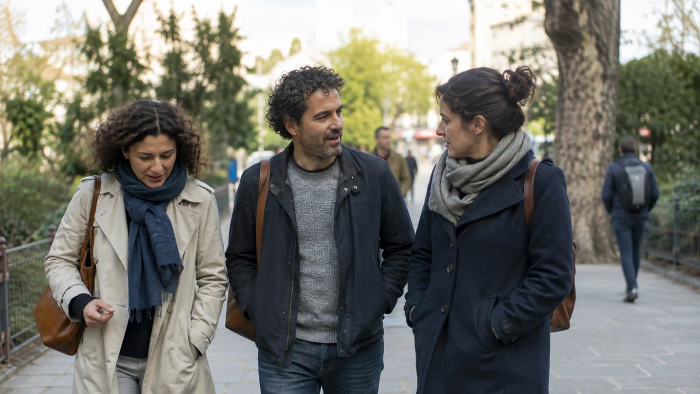 Two adults sharing an ordinary walk and conversation.
